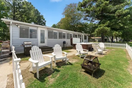 The Beach Retreat is a cozy beach Villa with Hottub overlooking a private beach.