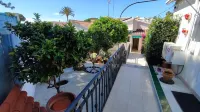 Casa con Jardín a 200m de la Playa. Ideal Para Toda la Familia. La Casa del Arco