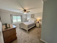 BACKYARD OASIS! Cozy and charming 60s Brick ranch with relaxing gazebo over pond