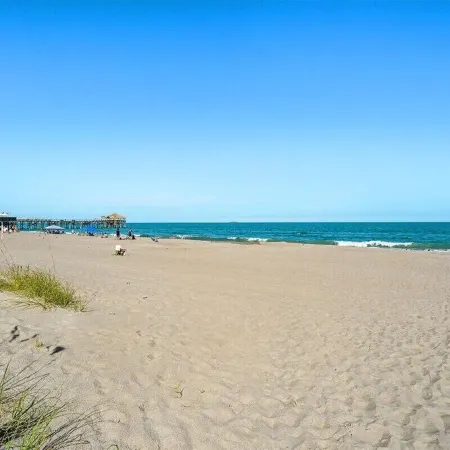 Affordable ONE BR Main Floor Condo RIGHT ON THE BEACH w/ KING Bed & Heated POOL!