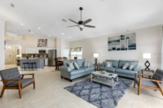 Lovely home near Disney with a Heated pool and game room in a resort community.