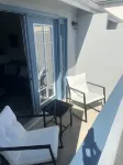 Clean and spacious unit with private balcony 1.5 blks from the beach!