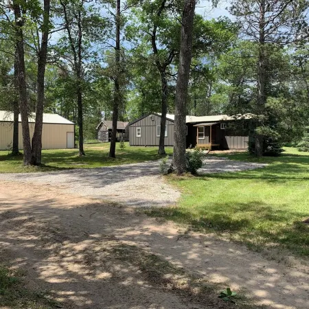 Minutes to town or very peaceful woods retreat! Close to trails and golf.