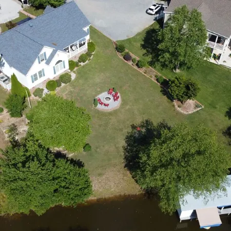 Spacious lakefront home with private boathouse and game room!