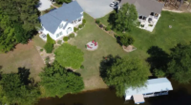 Spacious lakefront home with private boathouse and game room!