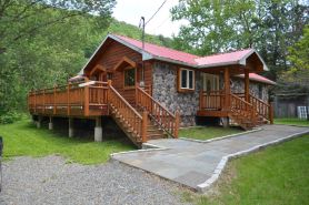 Spectacular Catskill Mountain River Front Custom Log Home