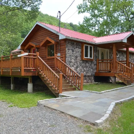 Spectacular Catskill Mountain River Front Custom Log Home