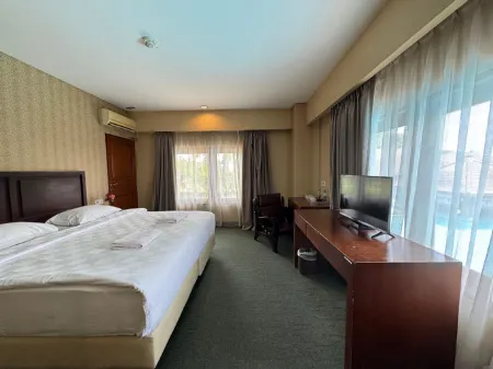 Labersa Garden Inn Отели в г. Siak Hulu