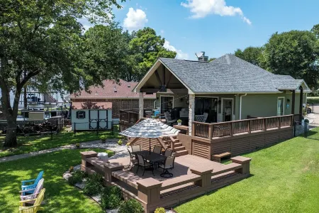 Dock, Fire Pit & Fenced Yard at Lakefront Retreat