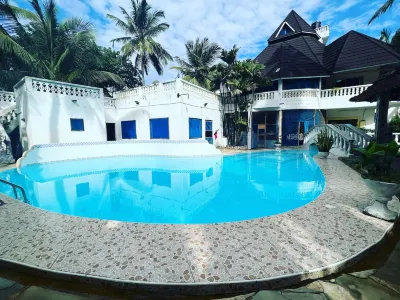 Lovely 5-Bed Room House with a Swimming Pool Hotels in 