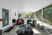 Stylish Kitchen and Lush Backyard Oasis - Modern Tropical Hotels in North Miami
