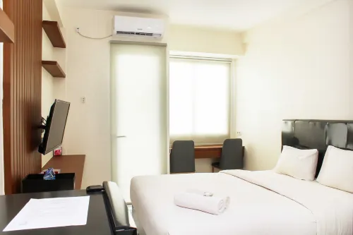 Nice and Elegant Studio at Riverview Jababeka Apartment - Parkplatz