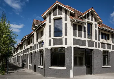 Hôtel Louvre-Lens - Esprit de France Отели в г. Вими