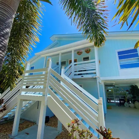 Antigua Cay Retreat is a stylish home with pool on deep water canal in Bokeelia