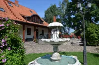 Dworek Mazurski Lizer فنادق في Wegorzewo County