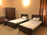 Babar House Hotels near E-Block Park