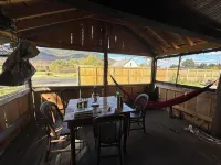 Classic original cedar log cabins set on Simms Stream in the North East Kingdom.