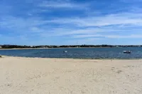 Your Perfect Beach Getaway Just a Block / 0.1 Mile Away!