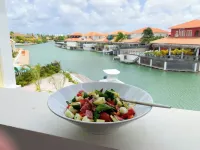 Private condo, water views, great breezes, well appointed for divers