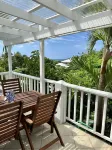 Enjoy the oceanview and relax poolside. Steps to World Famous Grace Bay Beach.