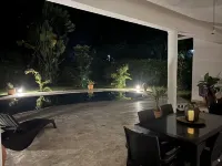 Private tropical home with pool! Short walk to beach, best restaurants, and spa!