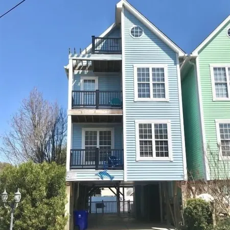 Blue Dolphin 6 Bedroom Home by RedAwning