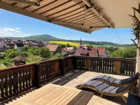 Cozy vacation apartment in the Rhön with a beautiful view from the balcony