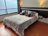 A few steps from the metro and Costanera shopping