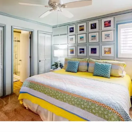 Spectacular partial ocean view 2BR 2BA large top floor condo-beachfront complex!