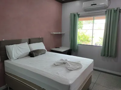 Suíte Aconchego IV Отели в г. 