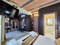 Suite with private outdoor space and garden view