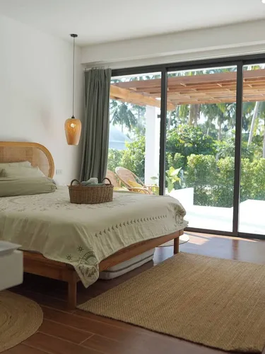 รูปภาพของO3 กรีน 2 ห้องนอน การ์เด้น พูลวิลล่า พร้อมเฟอร์นิเจอร์ที่มีเอกลักษณ์