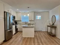 7 Bedroom 2 Floor Canal Home Steps from the Beach!