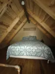 Quaint, secluded cabin with the feel of home. Sleeps 4 with home-like amenities.