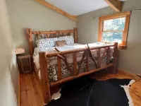 Unique Log Cabin Retreat on 138 Acres, swim, fish, boat, paddleboard, kayak!