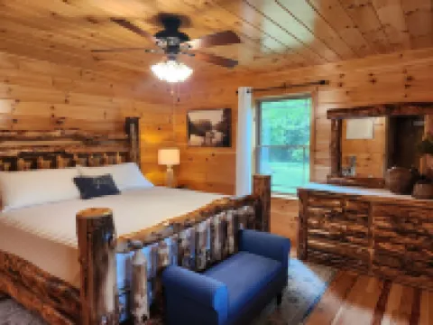 Cozy cabin in tranquil setting overlooking pond