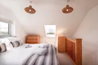 Spectacular one bedroom apartment , incredible coastal views, walk to the  beach
