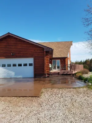 Log Cabin located minutes from Missouri River, airport, I-90,  and downtown.