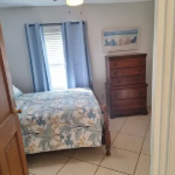 Lagoon shaped pool home with private back yard!