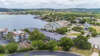 Luxury condo, DISCOUNTED RATES…steps to Lake, sleeps 10, near Yacht Club!