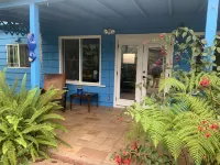 Charming beach cottage in a beautiful garden setting.