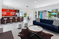 Orangetini Mid-Century Hollywood Regency Style Retreat -  Last Minute Specials!