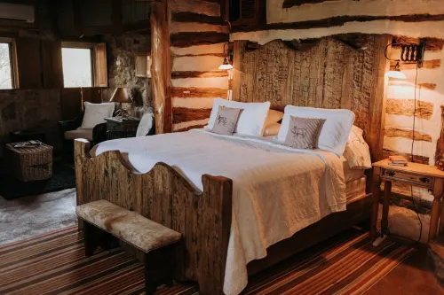 Stay at these upscale, historic cabins set in New Braunfels near Guadalupe River