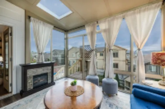 Spacious 5 Bedroom Home With Mountain Views, Heated Pool, & Sunroom!