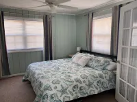 Affordable 2 Bed, 1.5 Bath Beach Views. Hot Tub, Pet Friendly, Fenced Back Yard. - 4-Star
