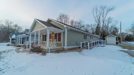 Charming 3-Bedroom House in Michigan City is Handicapp Friendly with a Ramp.