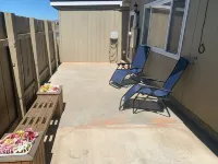 Two bedroom, three bathroom fenced yard. Game room with hide a bed. Pet friendly