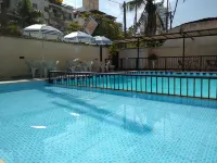 Pousada Parque Suites - Estacionamento e Piscina na Enseada - Park Yeri