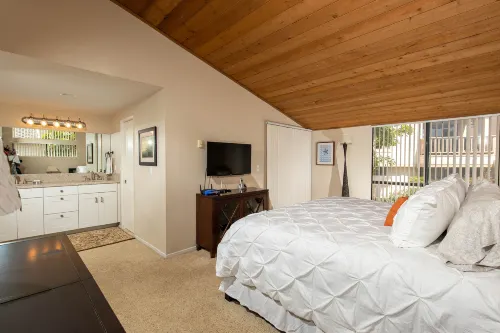 Expansive Oceanfront Patio and Resort-Style Amenities - Charming Coastal Haven