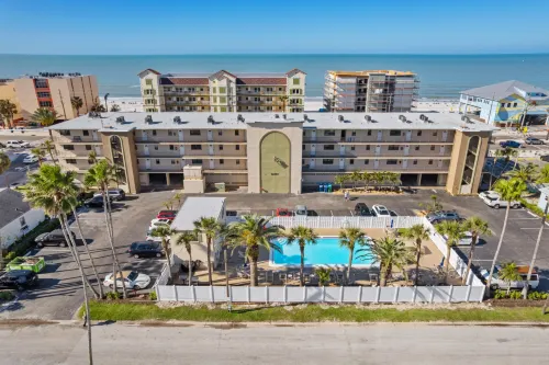 Private Balcony and Heated Pool Access - Charming Coastal Oasis